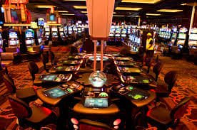 Slot game interface showing Aviator and Mahjong Ways tile layouts